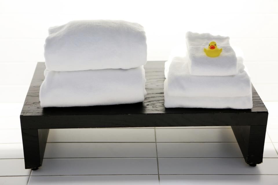 Calm treatment room with fresh towels at Jiameng Body and Foot Spa Huntington